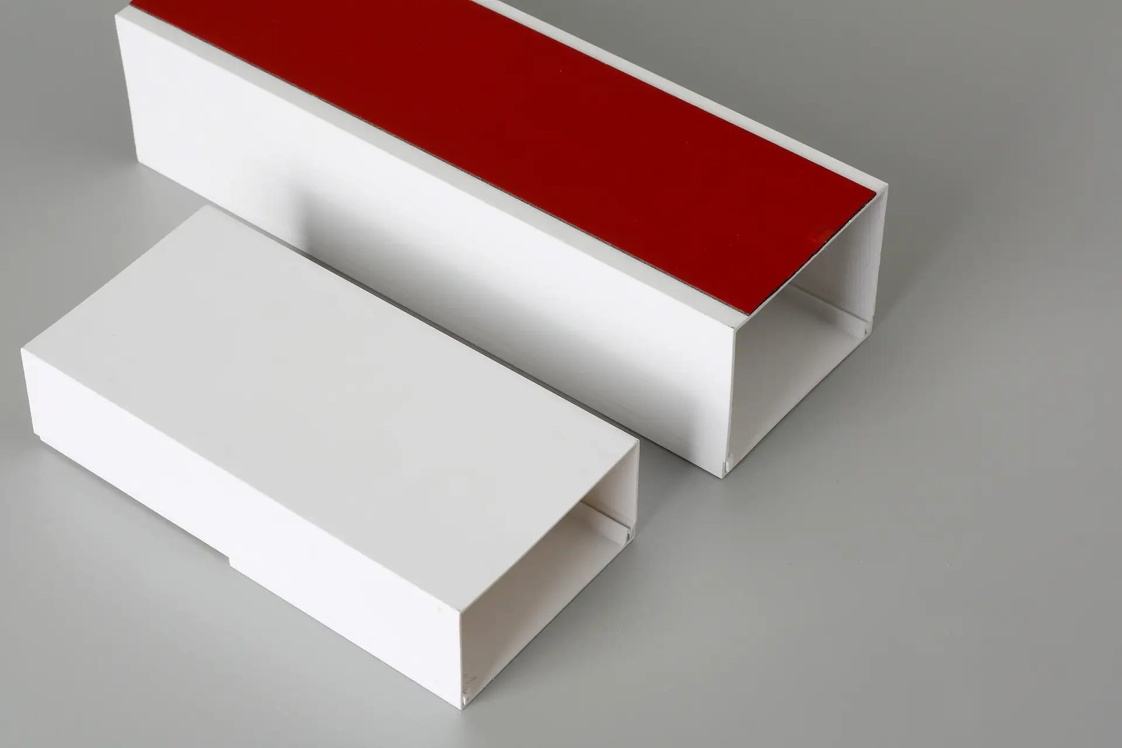White PVC Exposed Wiring Trunking with Red Cover Strip